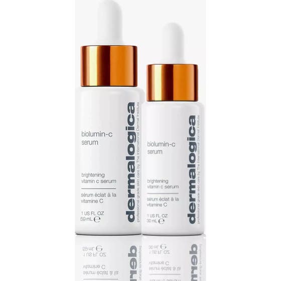 Dermalogica AGE smart Biolumin-C Serum 30 ml glødgivende vitamin C serum i hvite flasker med oransje metalliske detaljer