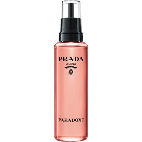 Prada Paradoxe EdP Refill 100 ml prada parfym refill i en hög flaska med rosa vätska och svart munstycke som ger ny parfym