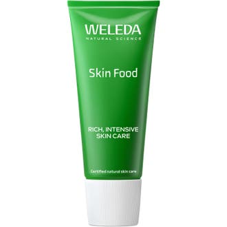 Weleda Skin Food Light 75 ml fuktighetskrem for tørr hud i en lysegrønn tube med hvit kork som gir umiddelbar pleie.