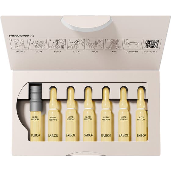 Babor Nutri Restore Ampoule 14 ml serum i åpen eske med syv glassampuller og bruksanvisning.