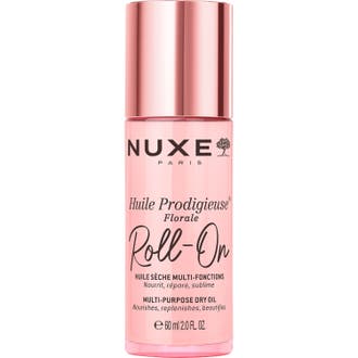Nuxe Huile Prodigieuse Florale Roll-On 8 ml vårdande torrolja i rosa glasflaska med glänsande rosa lock.