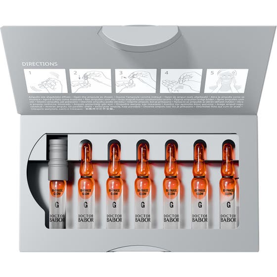 Babor Glow Bi-Phase Ampoule Serum 14 ml ansiktsserum gir glød med sju glassampuller i en åpen grå eske.