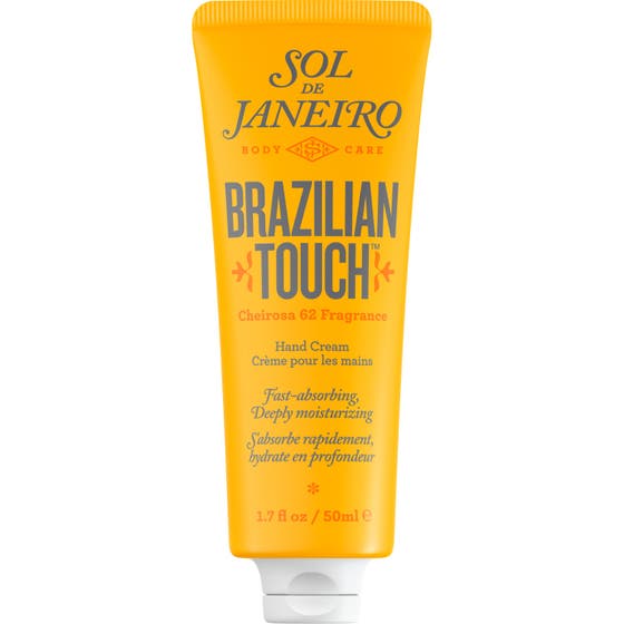 Sol de Janeiro Brazilian Touch 50 ml fuktighetsgivende håndkrem i en gul tube som absorberes raskt og gir myk hud.