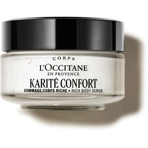 L'Occitane Shea Ultra Rich Body Scrub exfolierande kroppsskrubb i glasburk med svart lock och krämig textur.