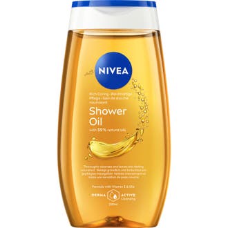 Nivea Rich Care Shower Oil 200 ml närande duscholja som ger mjuk hud i genomskinlig plastflaska med blått lock.