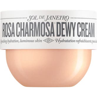 Sol de Janeiro Rosa Charmosa Dewy Cream fuktgivende kroppskrem i en skimrende ferskenfarget krukke med hvit etikett