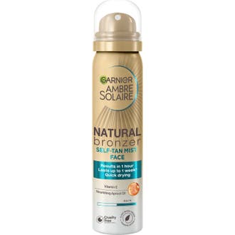 Garnier Ambre Solaire Natural Bronzer 75ml brun utan sol mist ansikte garnier i en bronsfärgad sprayflaska med lock.