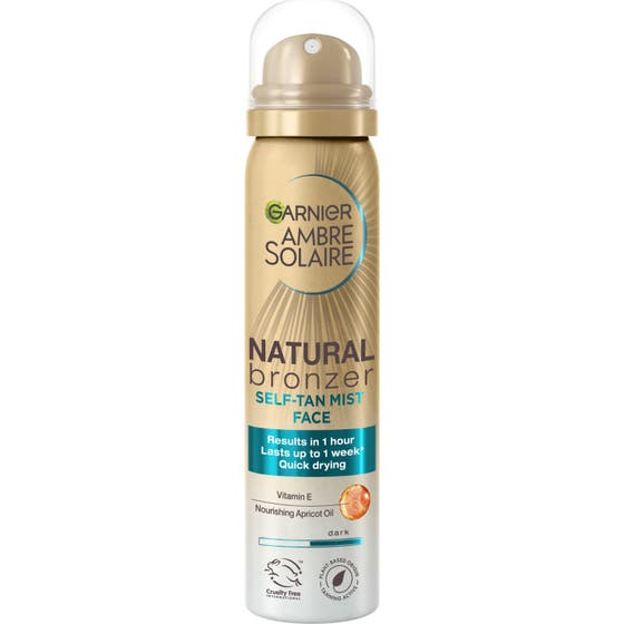 Garnier Ambre Solaire Natural Bronzer 75ml brun utan sol mist ansikte garnier i en bronsfärgad sprayflaska med lock.