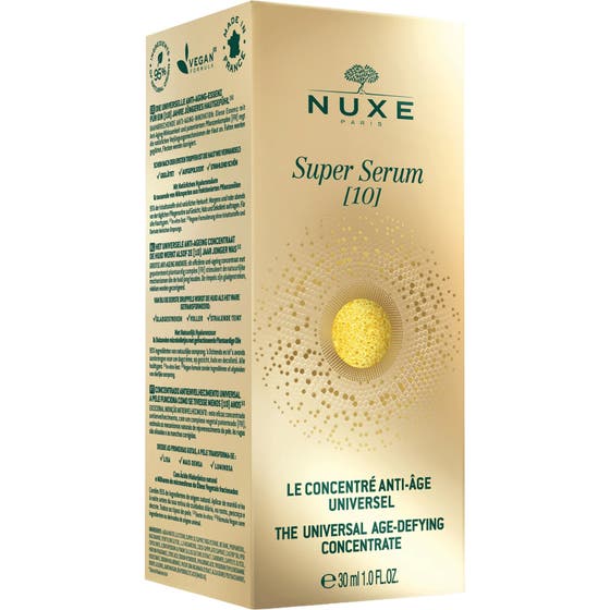 Nuxe Super Serum 30 ml anti-age serum med gyldne mikrokugler i åben glasflaske og pipette med guldhætte