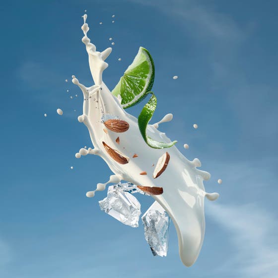 Biotherm Lait Corporel Active Recovery 400 ml genoprettende body lotion i hvid pumpeflaske der holdes i en hånd
