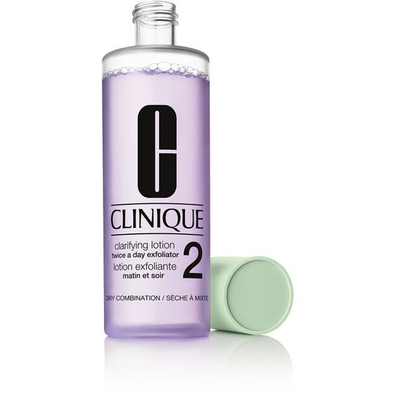 Clinique Clarifying Lotion 2 450 ml eksfolierende ansigtsvand i klar flaske med lilla væske og lysegrønt låg