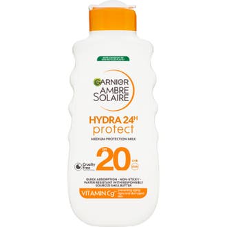 Garnier Ambre Solaire Hydra 24H Protect SPF 20 solkrem i hvit plastflaske med oransje lokk