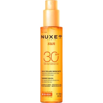 Nuxe Sun Tanning Sun Oil 150 ml anti-aging solskydd olja i orange sprayflaska som ger huden en vacker solbränna.