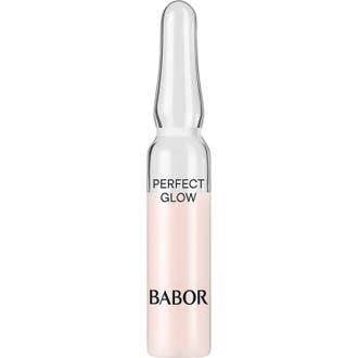 Babor Perfect Glow ampul glow-givende ansigtsserum i klar glasampul med lyserød væske og sort tekst