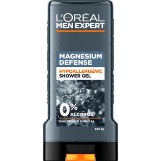 L'Oréal Men Expert Magnesium Defence Shower Gel beroligende dusjsåpe i grå transparent flaske med mineraldekor.