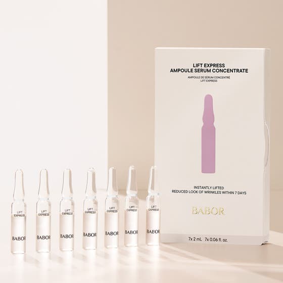 Babor Ampoule Lift Express 14 ml opstrammende serum i syv klare glasampuller ved siden af en hvid æske