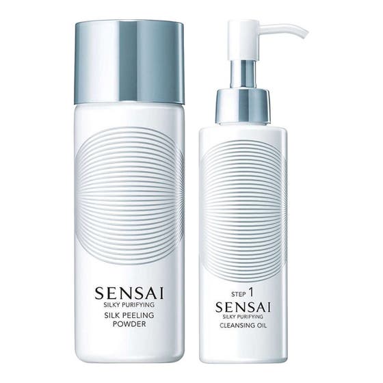 Sensai Silky Purifying Silk Peeling Powder og Cleansing Oil dybderensende duo i hvide flasker med sølvdetaljer
