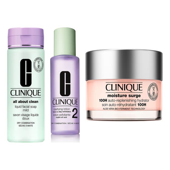 Clinique Hudplejesæt fugtgivende rutine med lilla og lysegrønne flasker samt ferskenfarvet creme i glaskrukke med sølvlåg