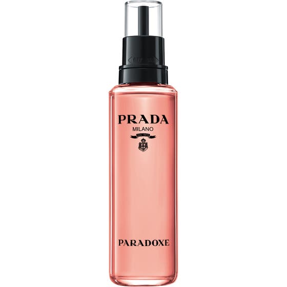 Prada Paradoxe EdP Refill 100 ml prada parfym refill i en hög flaska med rosa vätska och svart munstycke som ger ny parfym