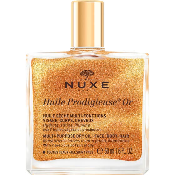 Nuxe Huile Prodigieuse Or 50 ml glitrende tørrolje i glassflaske med gullkork og skimrende gullpartikler