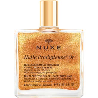 Nuxe Huile Prodigieuse Or 50 ml glitrende tørrolje i glassflaske med gullkork og skimrende gullpartikler