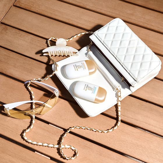 Sun Perfect AIR Daily Invisible Fluid Glow Booster SPF50