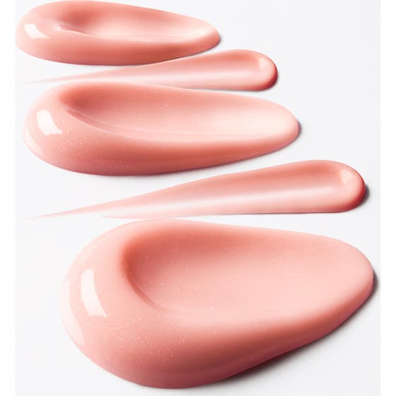 Biotherm Collagen Fit Body Cream 200 ml oppstrammende kroppskrem vist som en lys rosa tekstur på et lår.