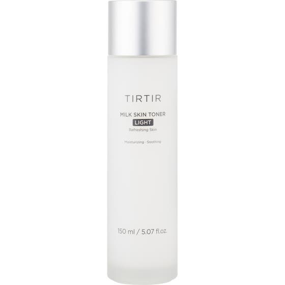 TIRTIR Milk Skin Toner Light 150 ml rauhoittava kasvovesi huurteisessa pullossa jossa on tyylikäs hopeinen korkki.