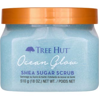 Tree Hut Ocean Glow Shea Sugar Scrub 510 g exfolierande kroppsskrubb med ljusblå kornig textur och orange lock.