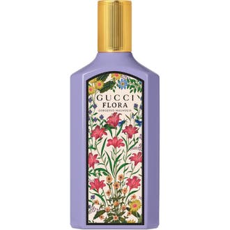 Gucci Flora Gorgeous Magnolia Eau de Parfum 100 ml i lilla glasflaske med blomstermotiv og gyldent låg