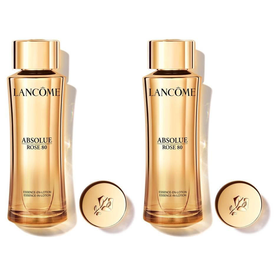 Lancôme Absolue Rose 80 roslotion lyxlotion för ansiktet i en gyllene glasflaska med guldkork och ingraverad ros.