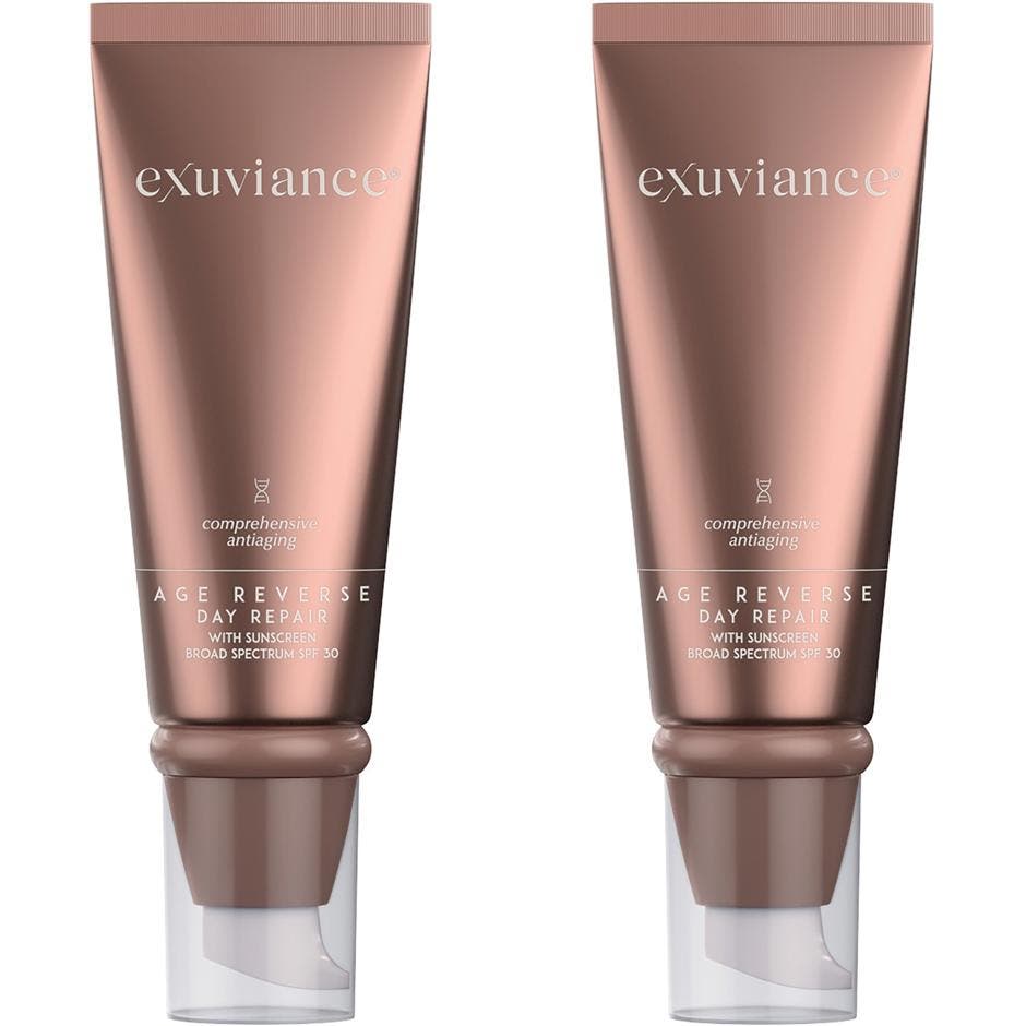Exuviance Age Reverse Day Repair 50 g anti-aging dagkrem i bronsefarget tube med pumpe og gjennomsiktig lokk