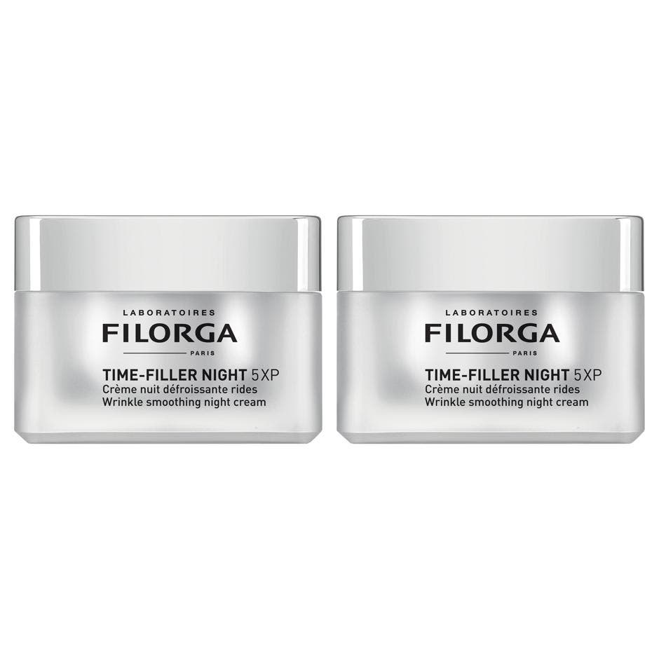 Filorga Time-Filler Night 5XP 50 ml anti-aging nattkräm ger avancerad rynkreducering i en fyrkantig silverfärgad burk.