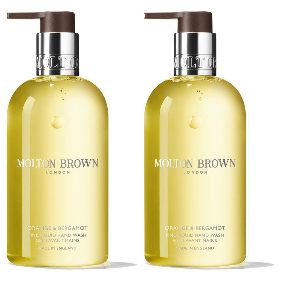 Molton Brown Orange & Bergamot 300 ml lyxig flytande handtvål med gul gel i genomskinlig flaska med silverpump.